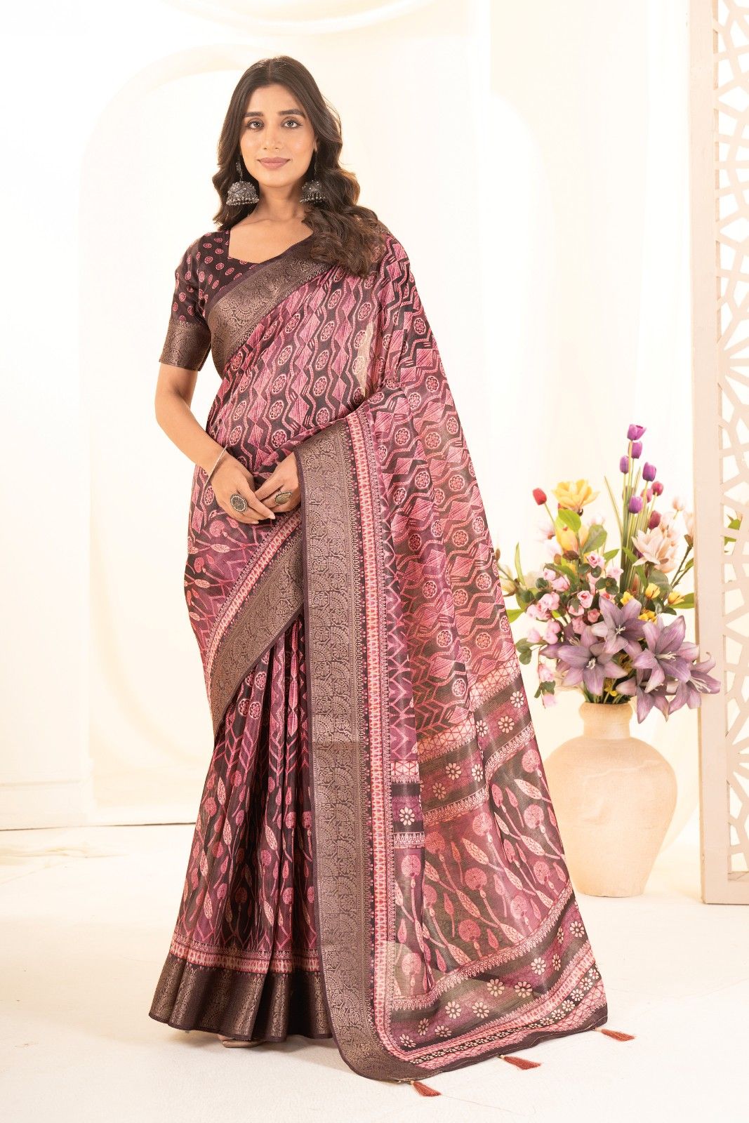 Tusser silk saree with Ajrak digital print and finished with fancy latkans.