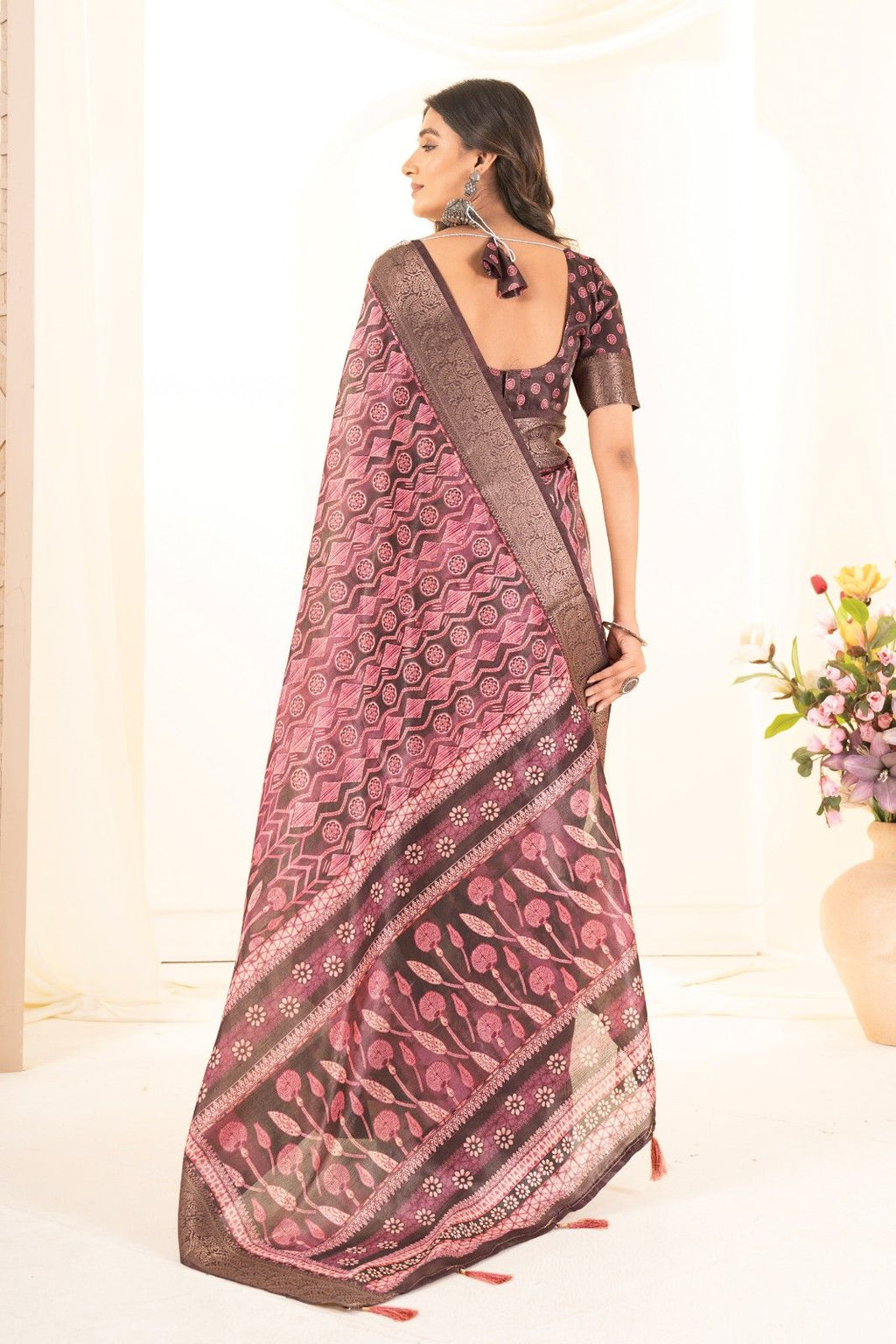 Tusser silk saree with Ajrak digital print and finished with fancy latkans.