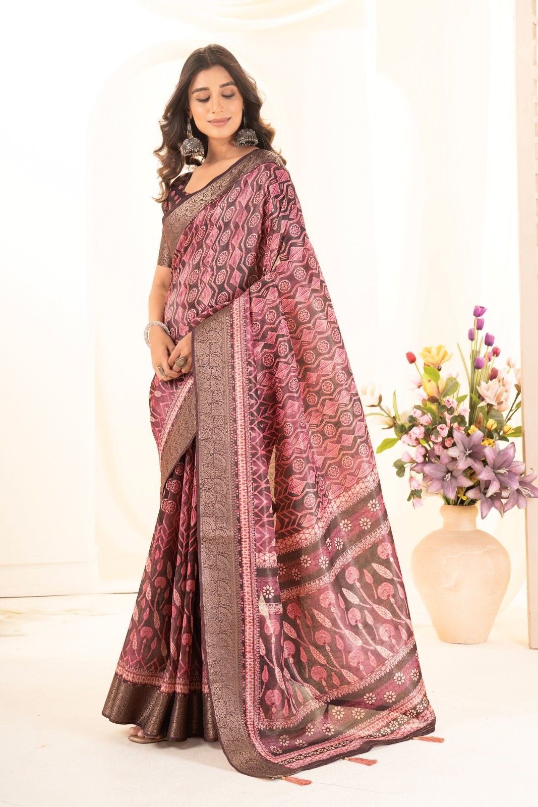 Tusser silk saree with Ajrak digital print and finished with fancy latkans.