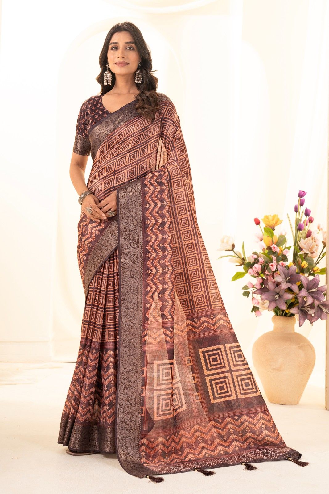 Tusser silk saree with Ajrak digital print and finished with fancy latkans.