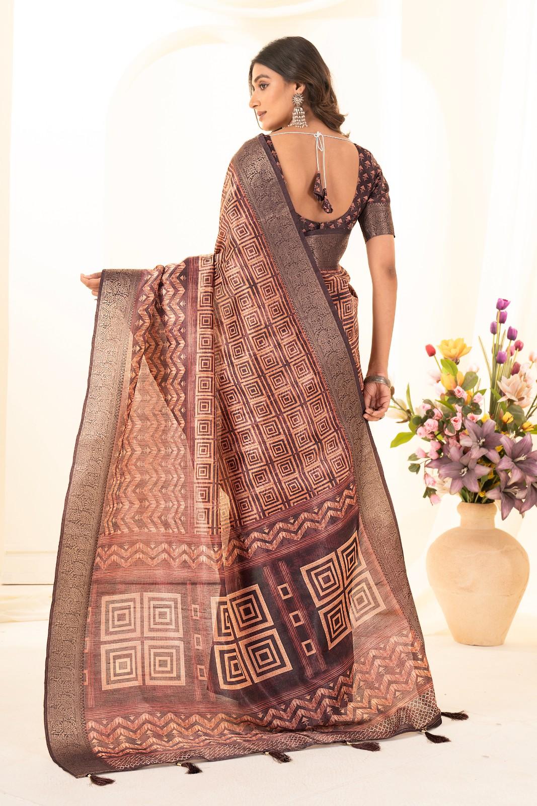 Tusser silk saree with Ajrak digital print and finished with fancy latkans.