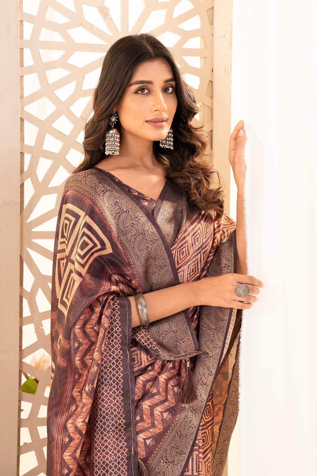 Tusser silk saree with Ajrak digital print and finished with fancy latkans.