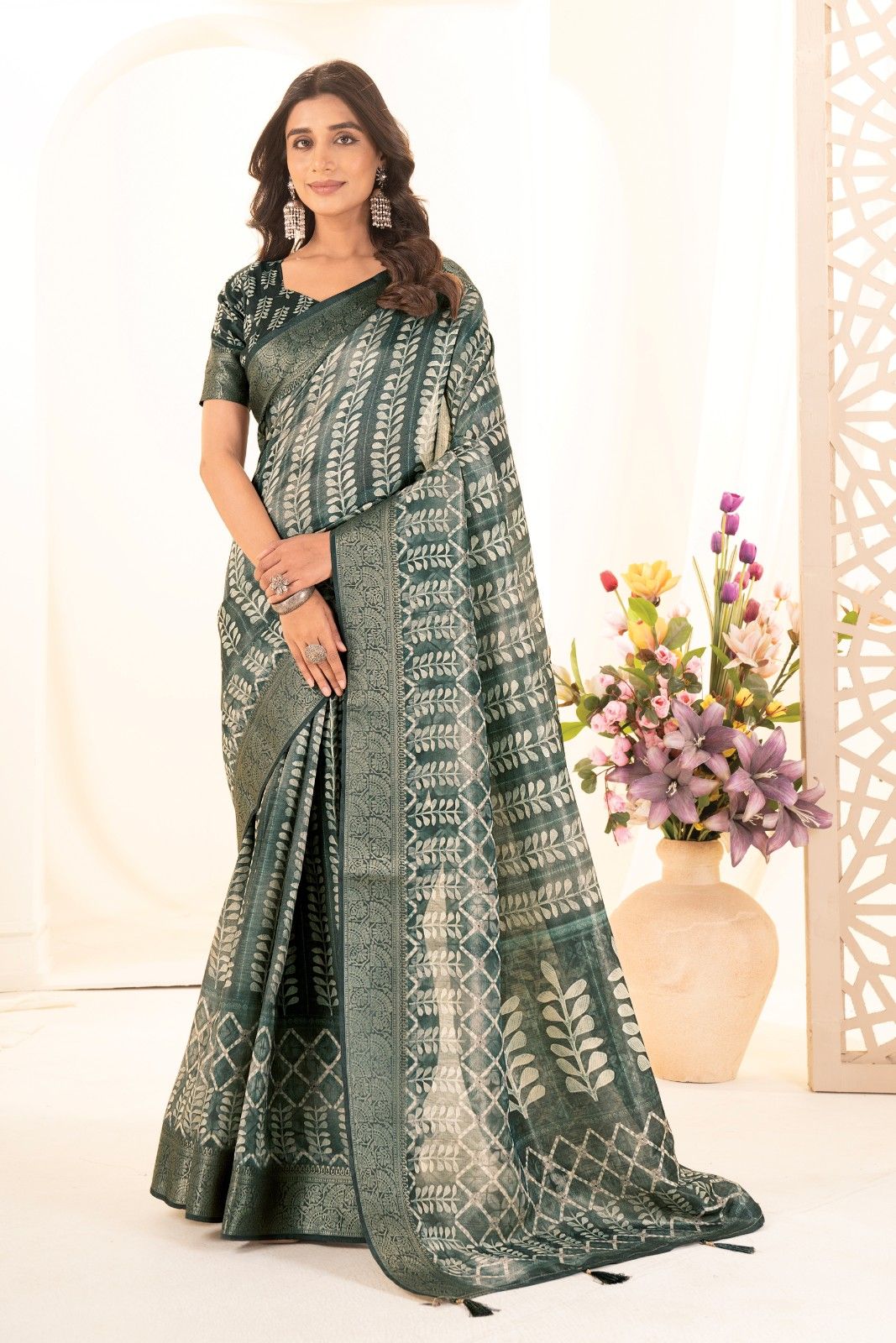 Tusser silk saree with Ajrak digital print and finished with fancy latkans.