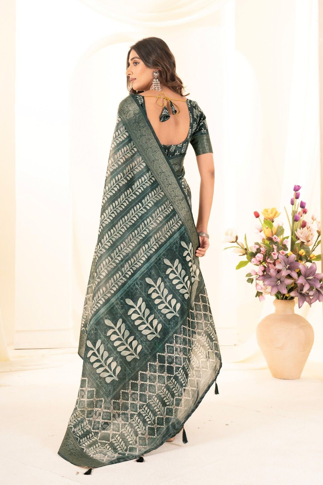 Tusser silk saree with Ajrak digital print and finished with fancy latkans.