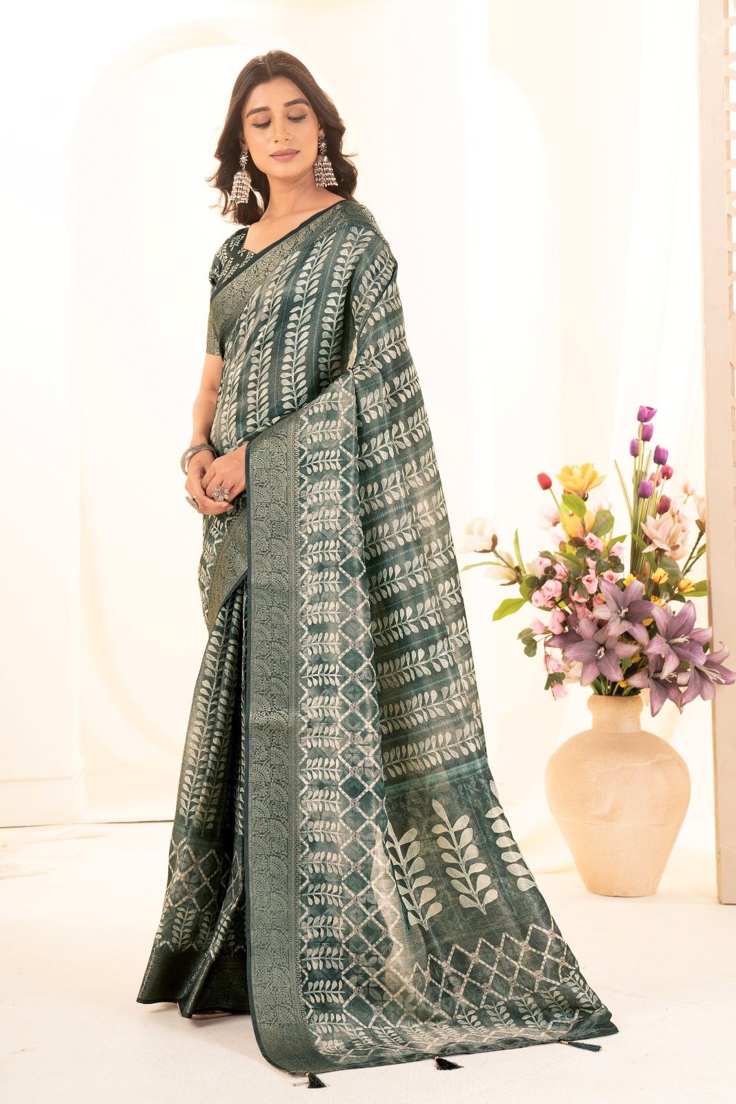 Tusser silk saree with Ajrak digital print and finished with fancy latkans.