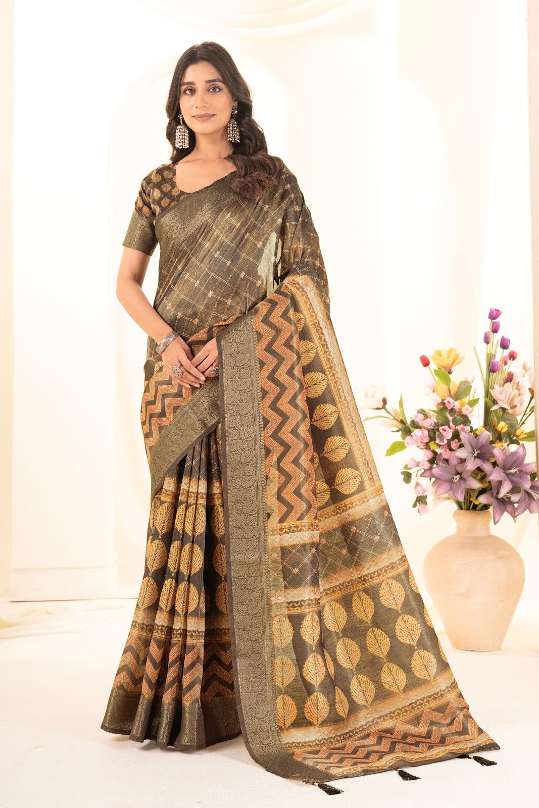 Tusser silk saree with Ajrak digital print and finished with fancy latkans.
