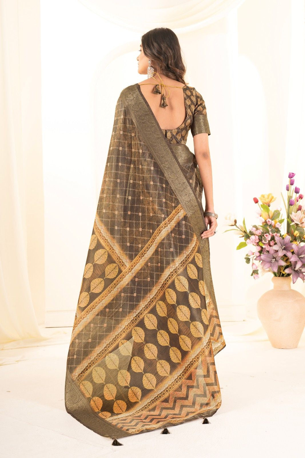 Tusser silk saree with Ajrak digital print and finished with fancy latkans.