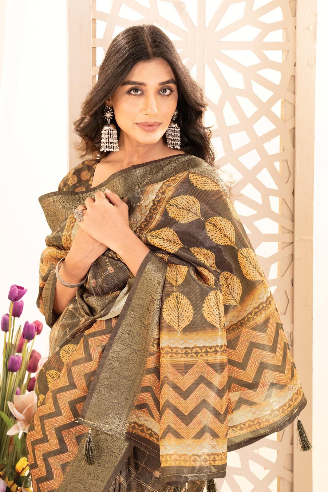 Tusser silk saree with Ajrak digital print and finished with fancy latkans.