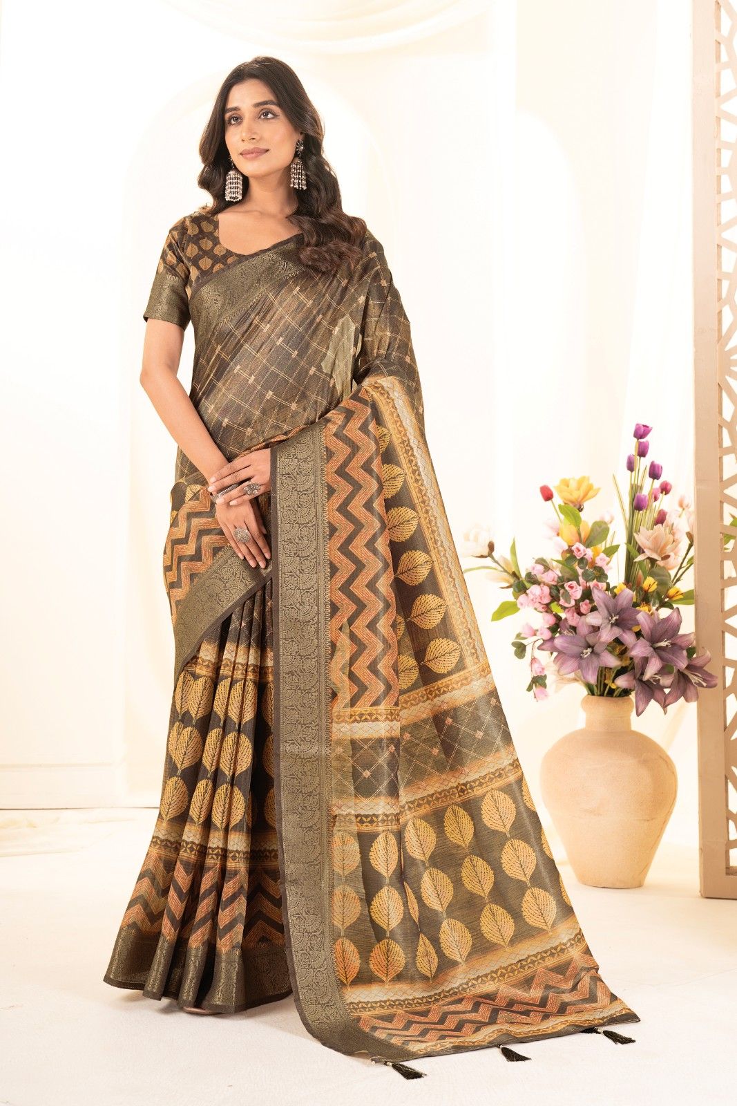 Tusser silk saree with Ajrak digital print and finished with fancy latkans.