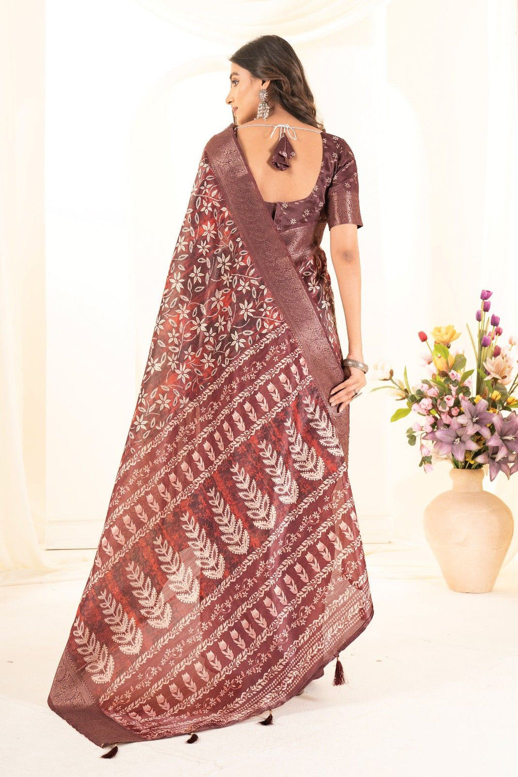 Tusser silk saree with Ajrak digital print and finished with fancy latkans.