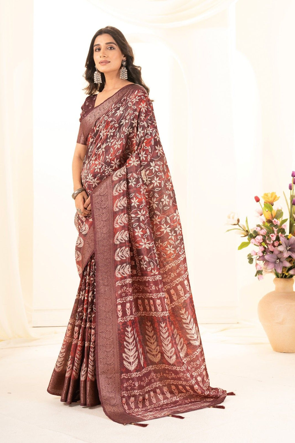 Tusser silk saree with Ajrak digital print and finished with fancy latkans.