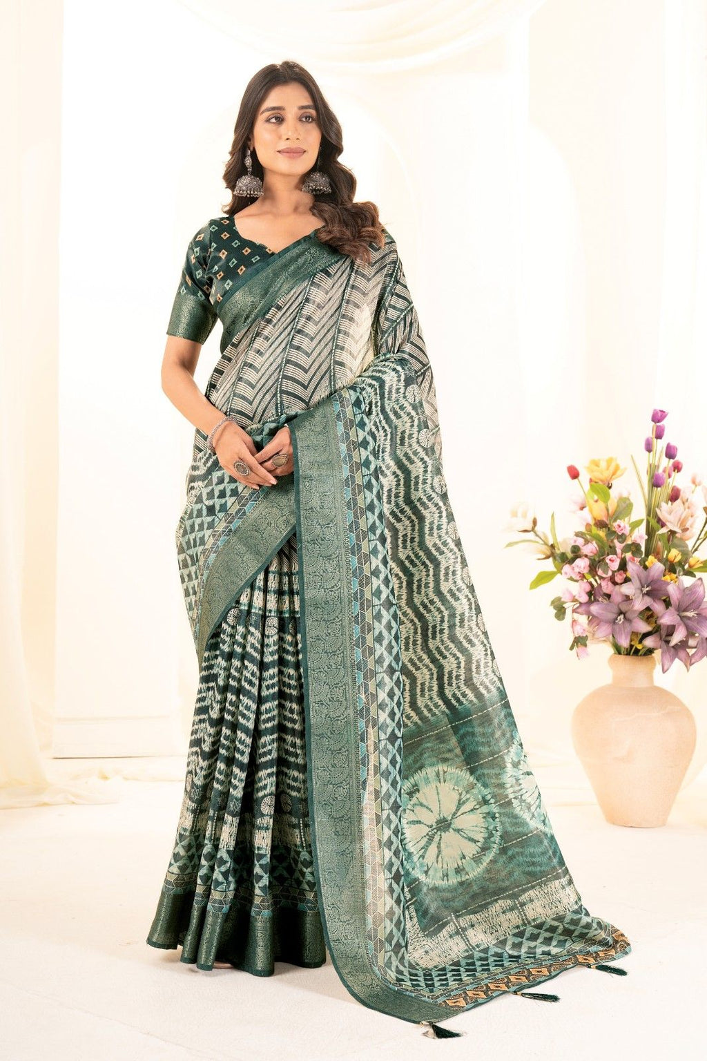 Tusser silk saree with Ajrak digital print and finished with fancy latkans.