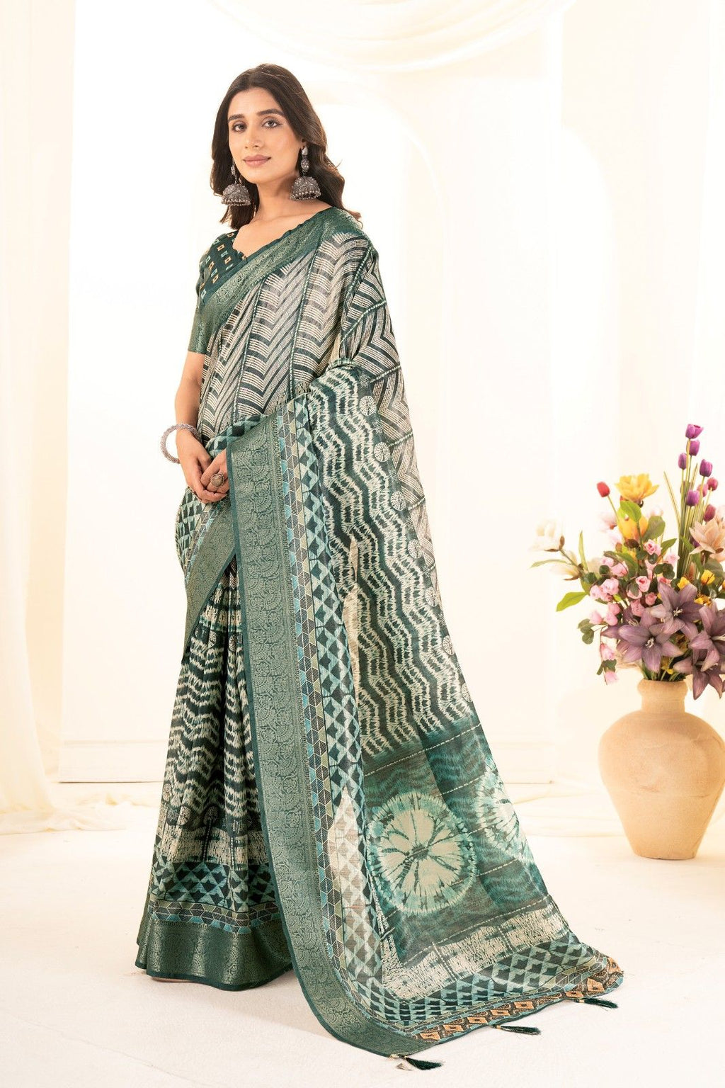 Tusser silk saree with Ajrak digital print and finished with fancy latkans.