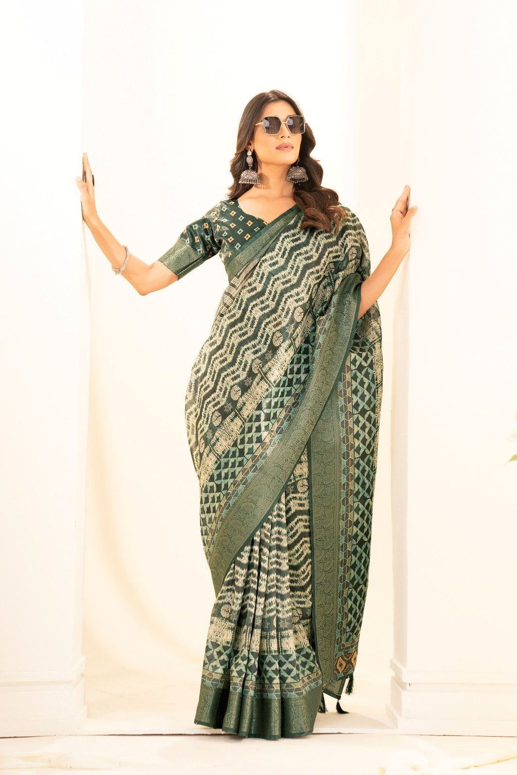 Tusser silk saree with Ajrak digital print and finished with fancy latkans.