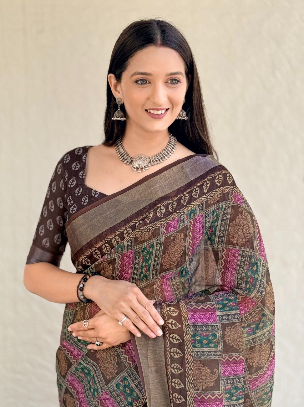 Silk Saree with ethnic floral and geometric motifs