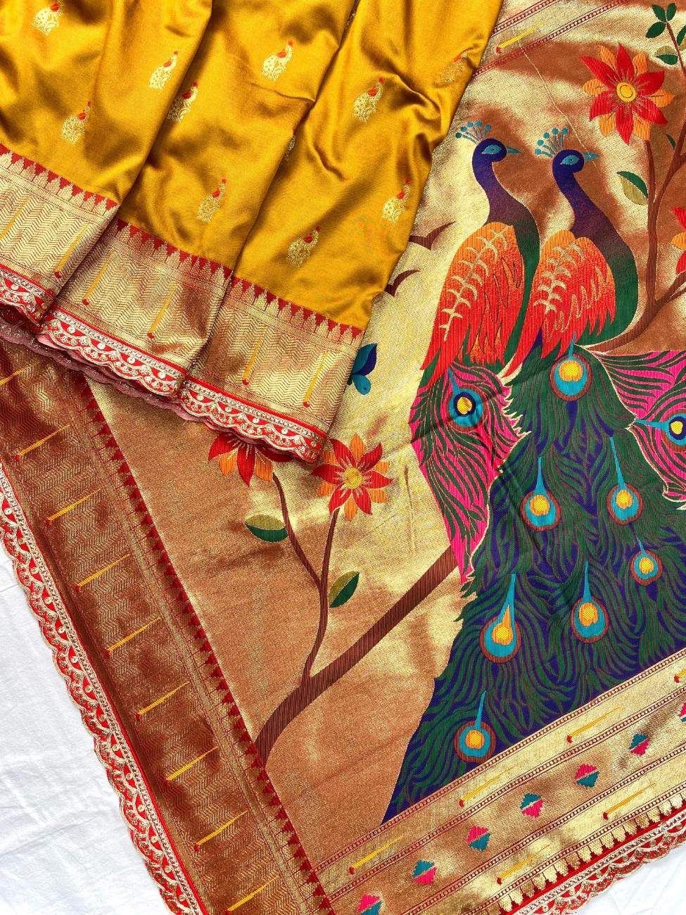 Pure Paithani silk saree with all-over meenakari weaving, vibrant contrast peacock pallu