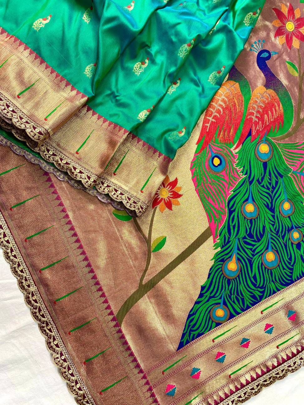 Pure Paithani silk saree with all-over meenakari weaving, vibrant contrast peacock pallu