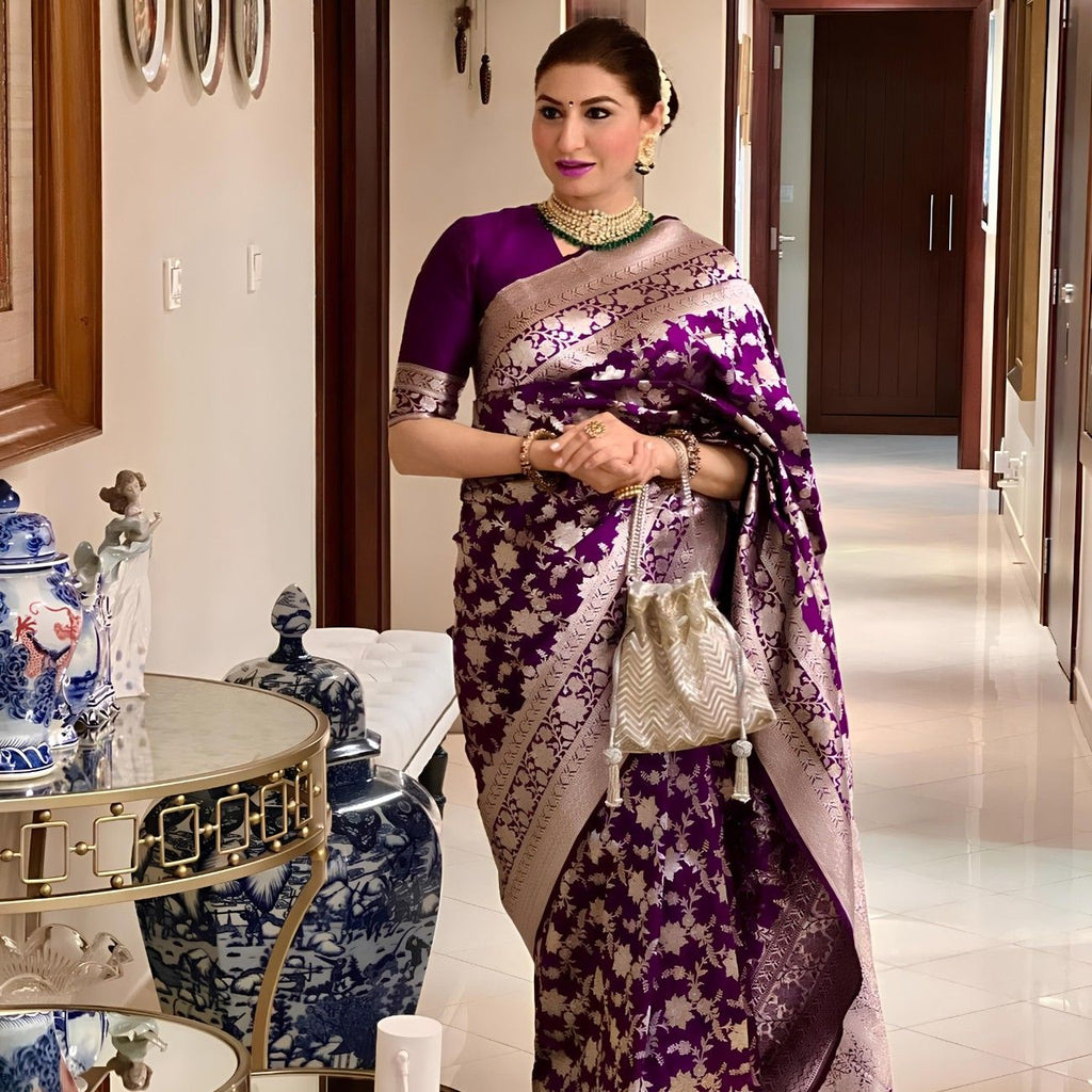 Premium Dola Silk Saree With Rich Floral Silver Zari Weaving And Royal Border
