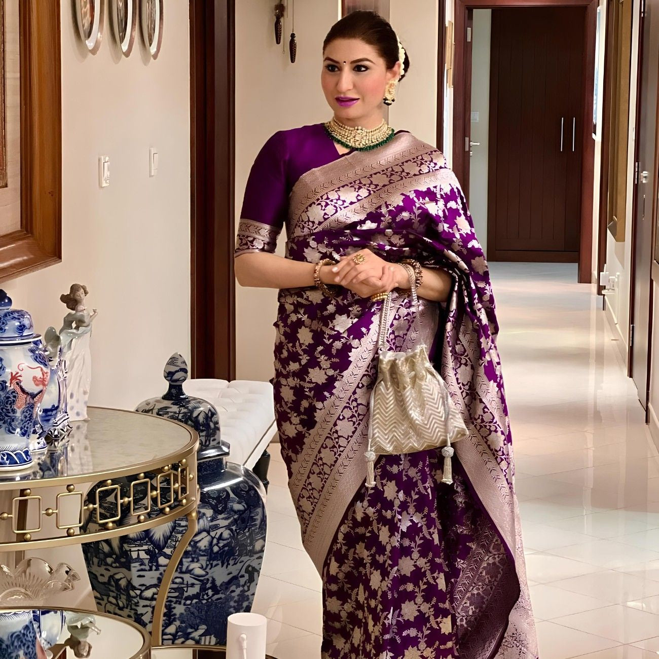 Premium Dola Silk Saree With Rich Floral Silver Zari Weaving And Royal Border