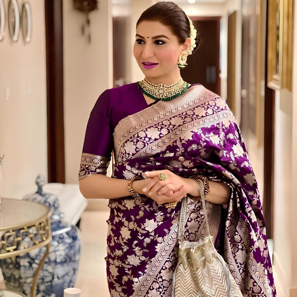 Premium Dola Silk Saree With Rich Floral Silver Zari Weaving And Royal Border