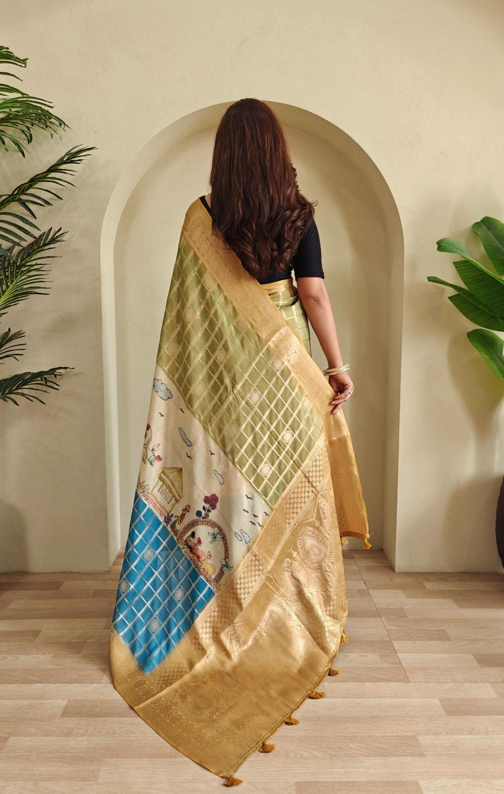 Georgette Weaving Saree with all-over digital prints, silver zari check pattern, rich pallu.