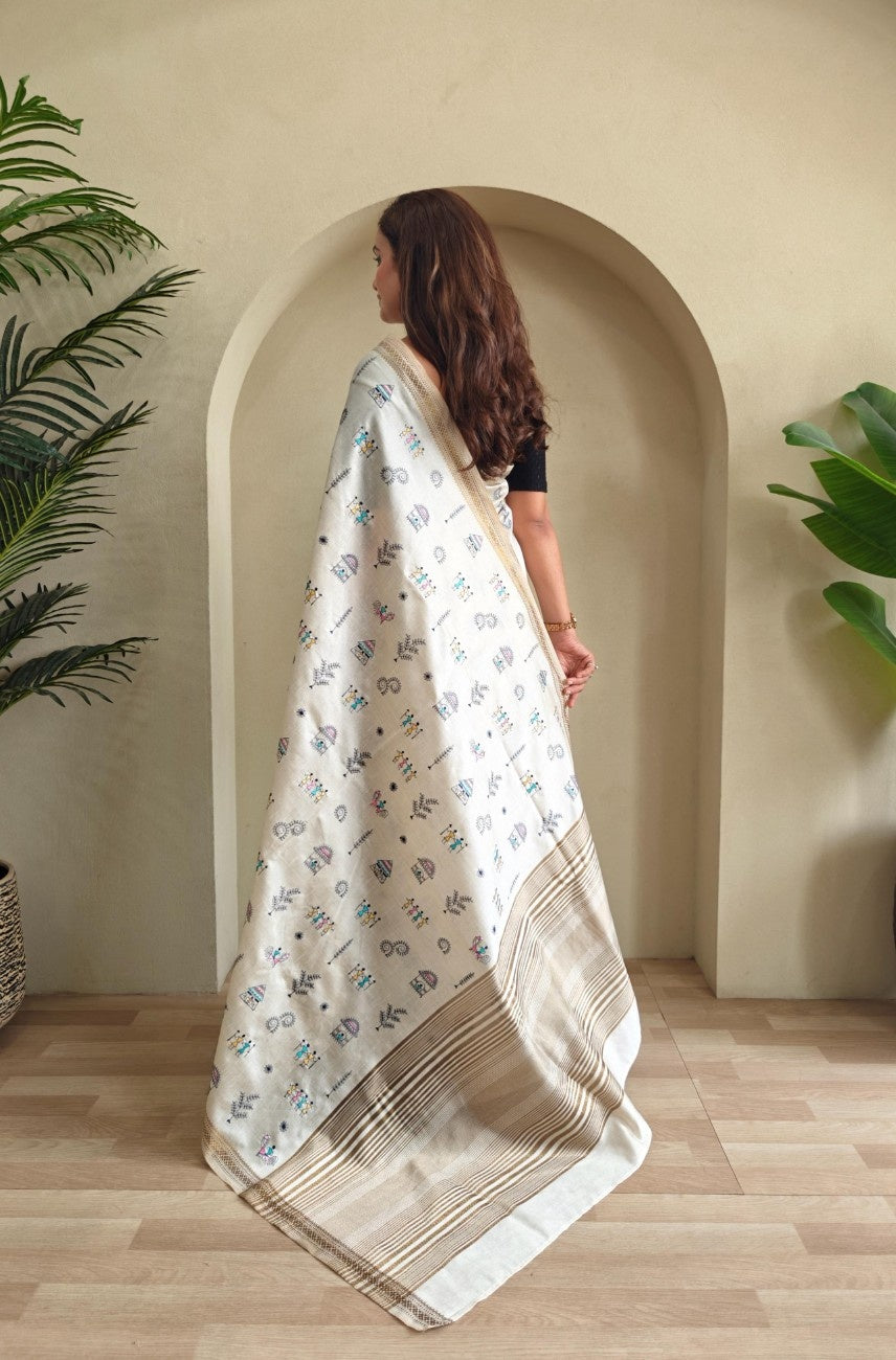 Pure Loom Tussar Saree With  Worli-inspired embroidery motifs.