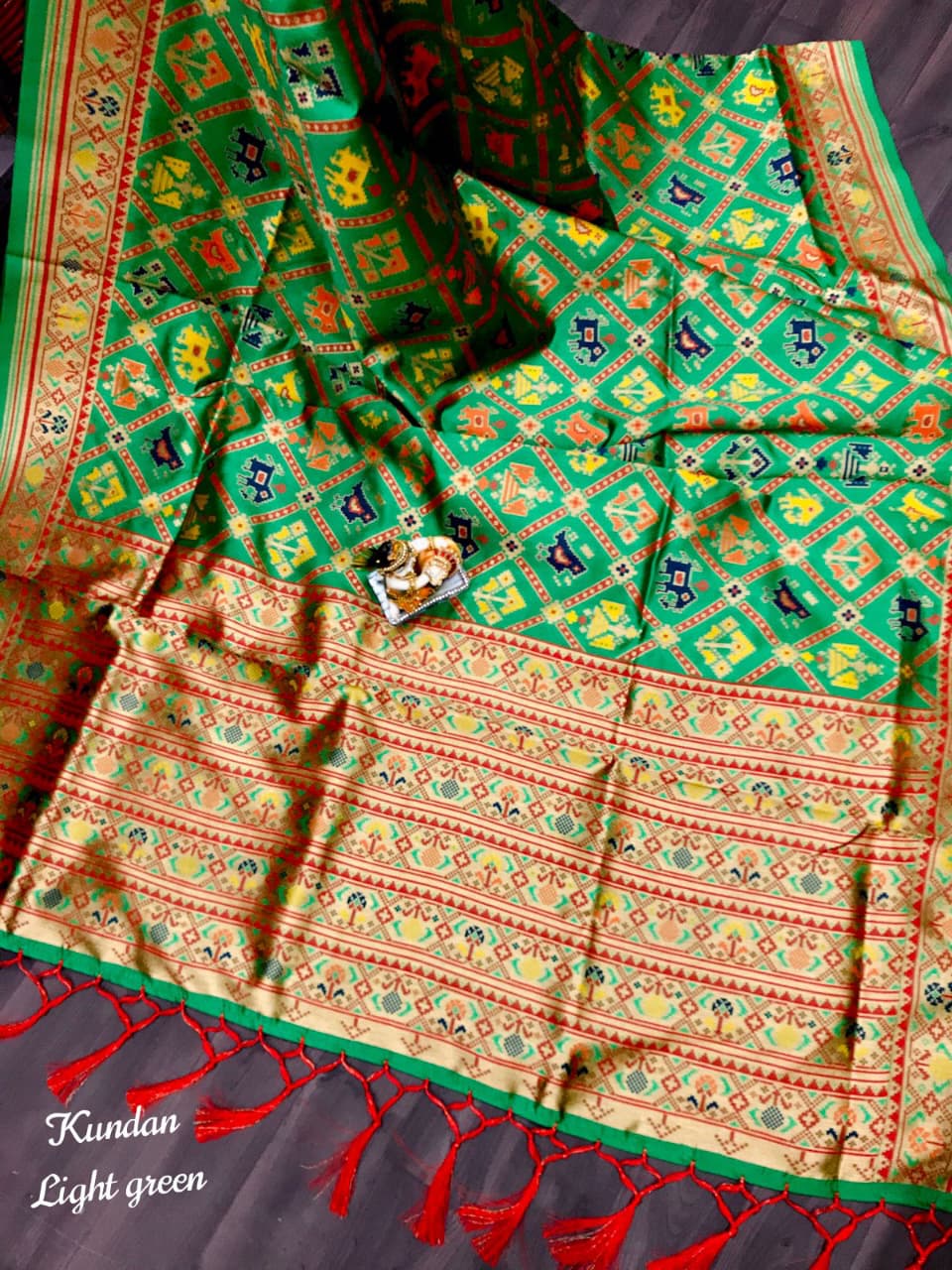 Superior Banarasi-style Patola saree with heavy weaving, contrast Meena work, rich pallu