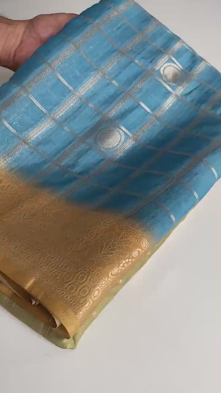 Georgette Weaving Saree with all-over digital prints, silver zari check pattern, rich pallu.
